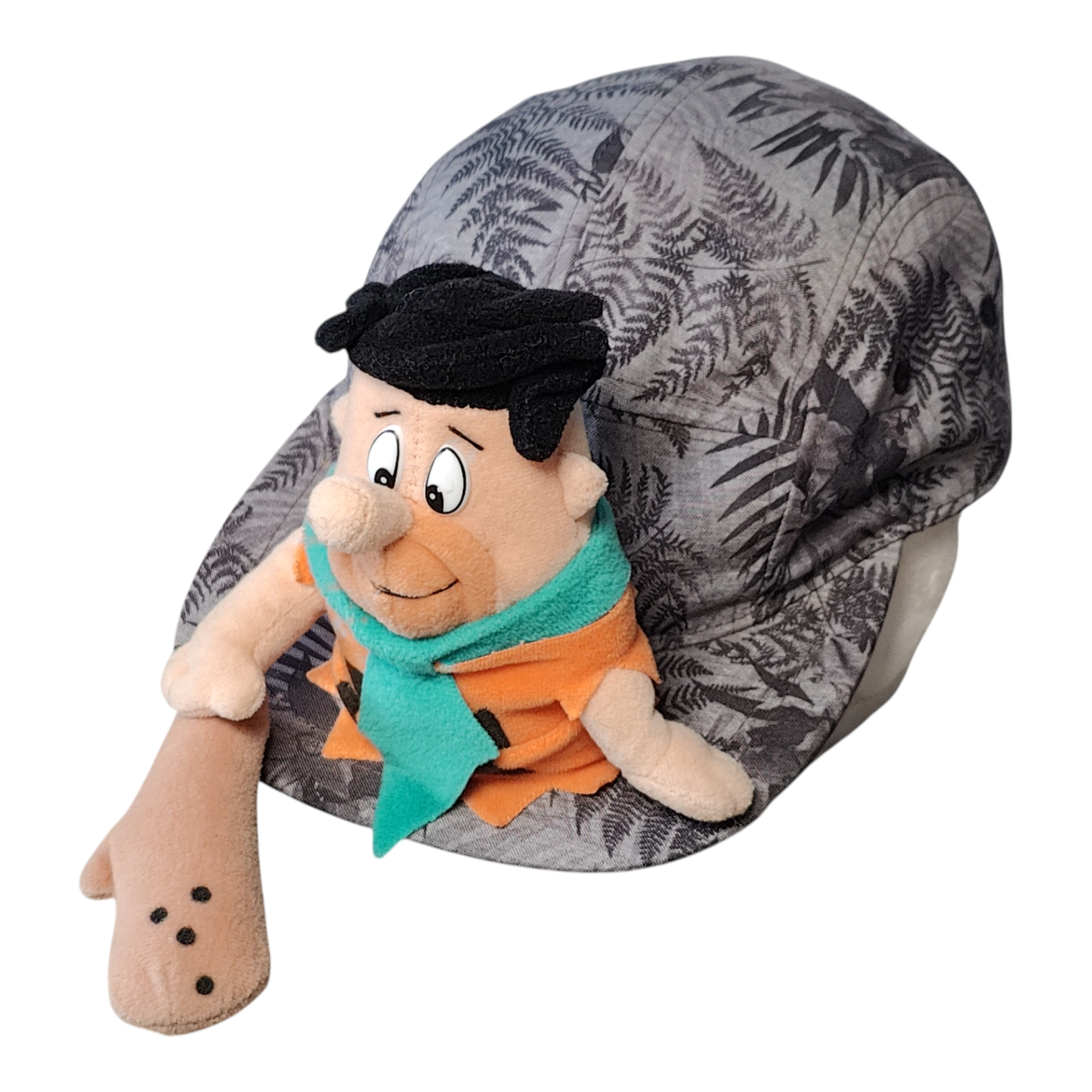 Casquette personnage préhistorique